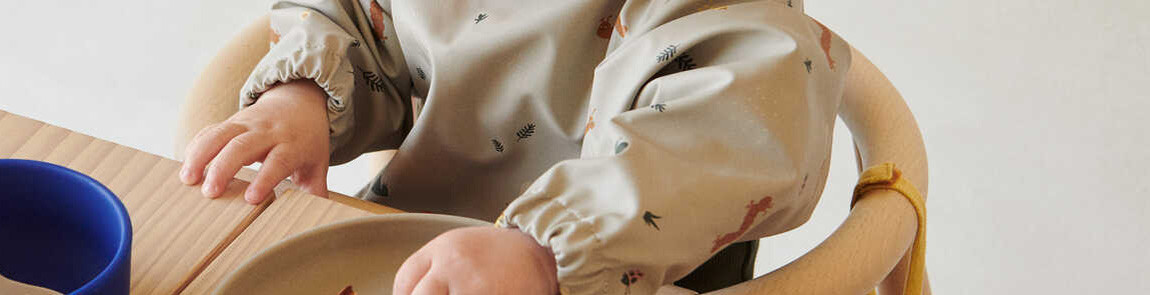 Bavoirs à manches Bavoirs à manches